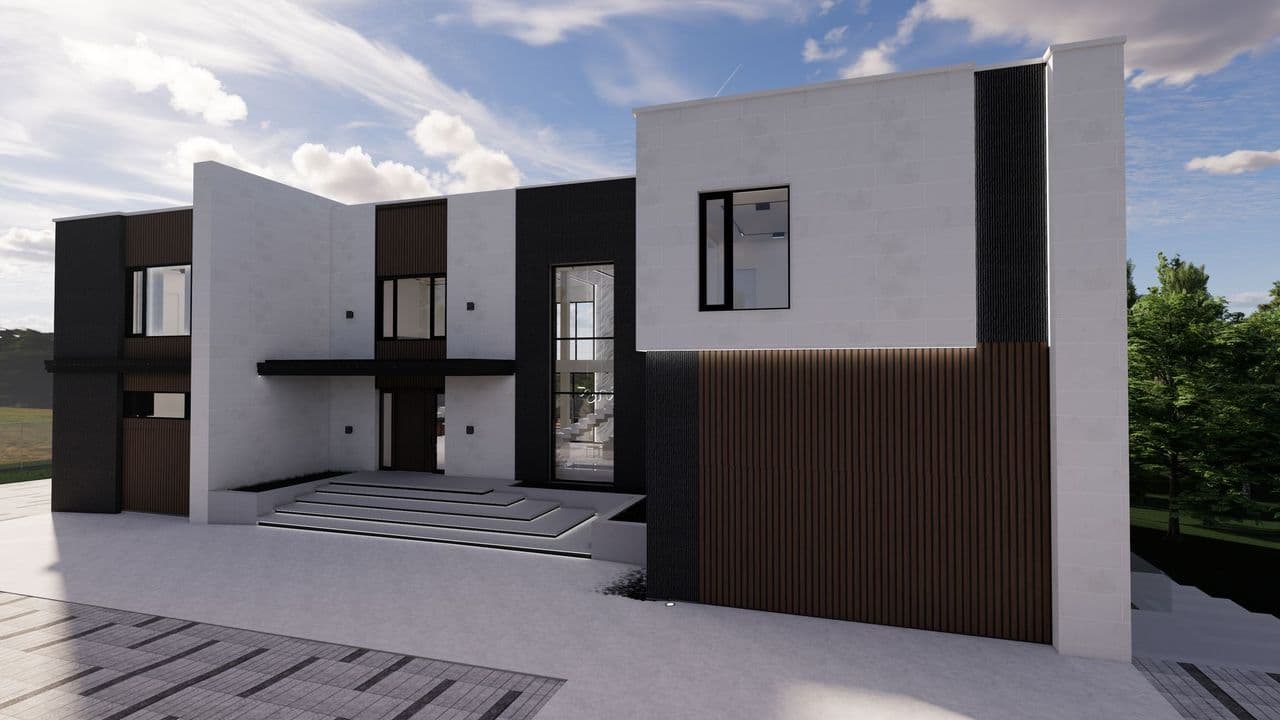 Modern minimalist house featuring white stone, black accents, and vertical wood paneling under a blue sky.